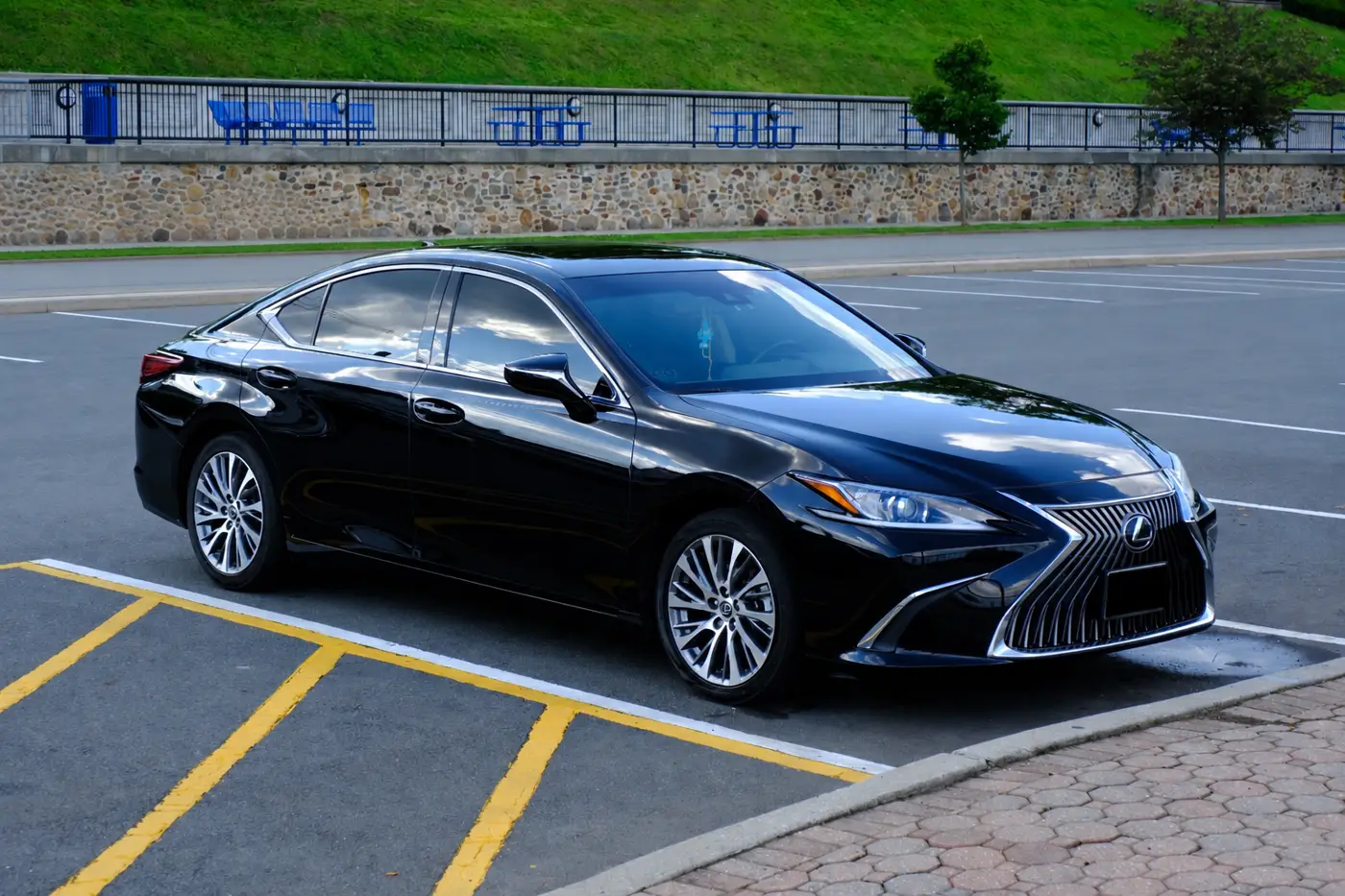 Black Lexus ES 350 parked in sunlight
